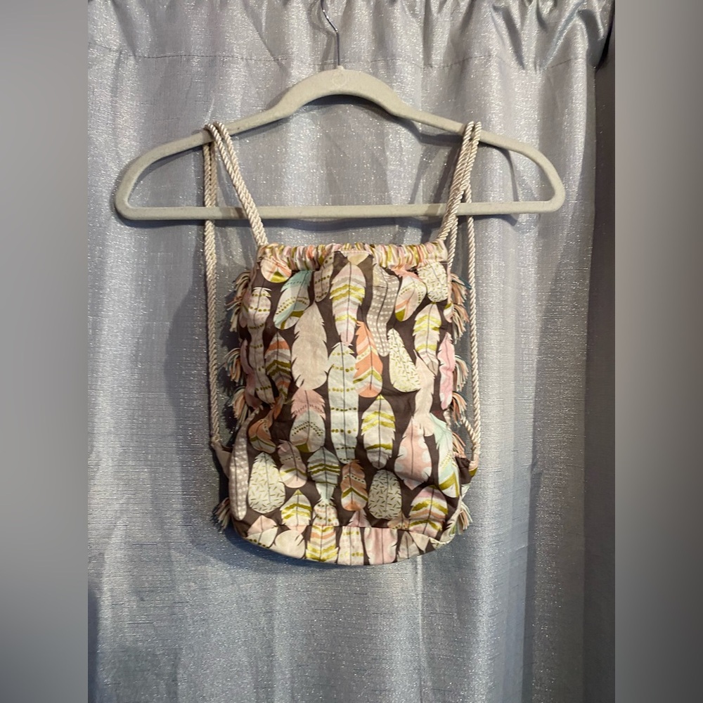 Feather and fringe drawstring Backpack